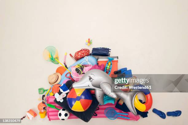 germany, artificial scene with heap of beach toys - sports equipment pile stock pictures, royalty-free photos & images