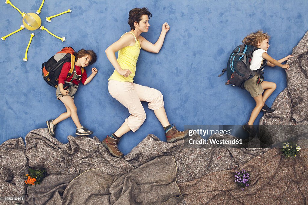 Germany, Artificial scene of family mountaineering