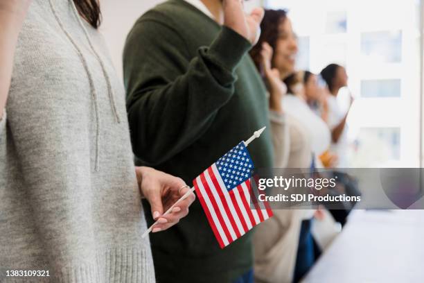 multiracial group - american flag on stand stock pictures, royalty-free photos & images