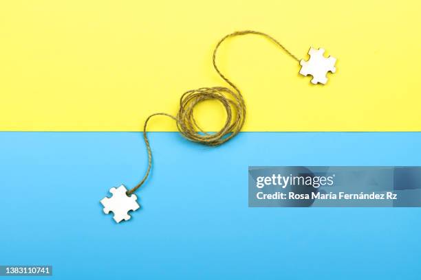 Connection Between Pieces Using String 179 Autism Puzzle Pieces Stock Photos, High-Res Pictures, and Images ...