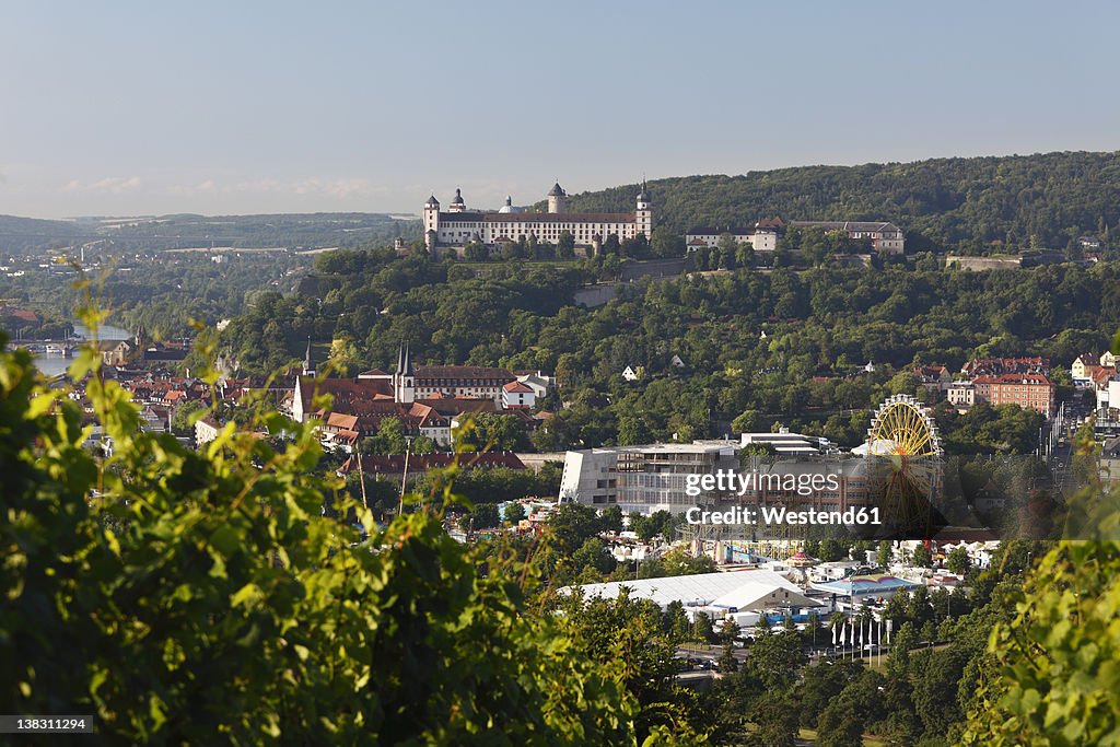 Germany, Bavaria, Wuerzburg, View of kiliani fair and fortress marienberg