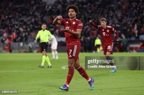 Serge Gnabry of FC Bayern Muenchen celebrates after scoring their team's fourth goal during the UEFA Champions League Round Of Sixteen Leg Two match...