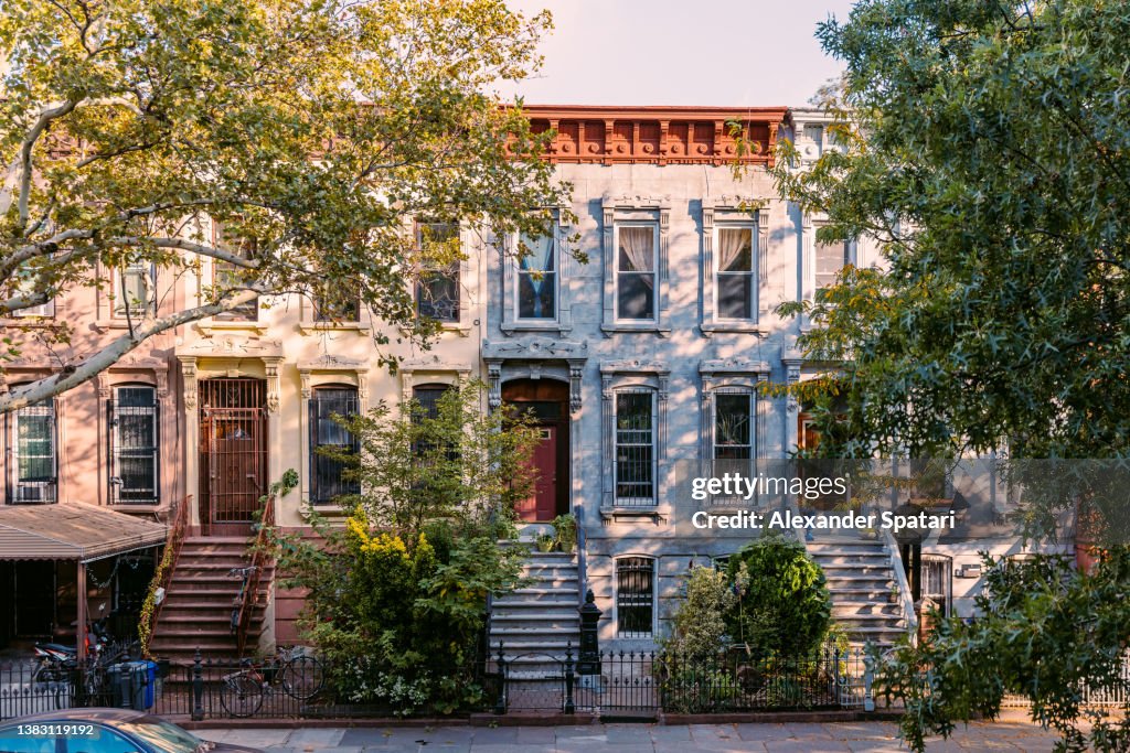 Street with residential townhouses in Brooklyn, New York City, USA
