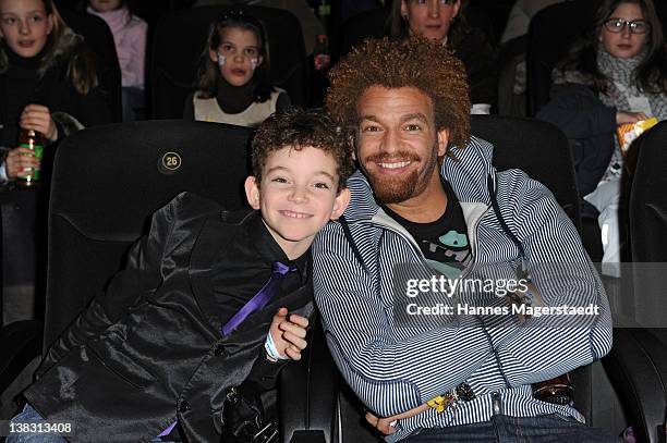 Singer Martin Rufus and his son Noah attend the Yoko Premiere at the Mathaeser Filmpalast on February 5, 2012 in Munich, Germany.