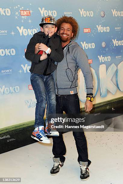 Singer Martin Rufus and his son Noah attend the Yoko Premiere at the Mathaeser Filmpalast on February 5, 2012 in Munich, Germany.