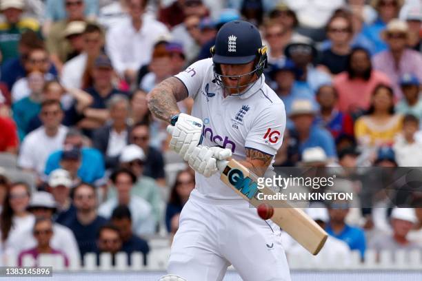 England's captain Ben Stokes plays a shot for four runs on day five of the second Ashes cricket Test match between England and Australia at Lord's...