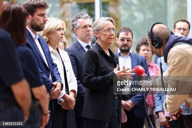 French Prime Minister Elisabeth Borne addresses journalists in front of Ile-de-France Region President Valerie Pecresse and the Mayor of...