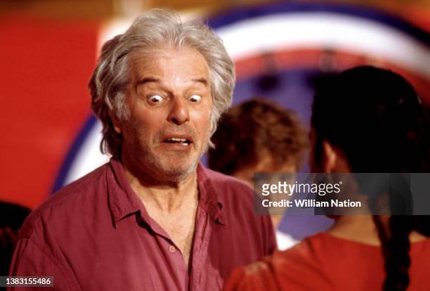 Chilean-French filmmaker and artist Alejandro Jodorowsky, makes a face while talking to Mexican actress Blanca Guerra before filming a scene during...