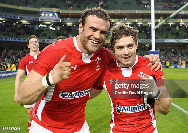 Leigh Haflpenny of Wales celebrates with team mate Jamie Roberts after kicking the last minute match winning penalty during the RBS Six Nations match...