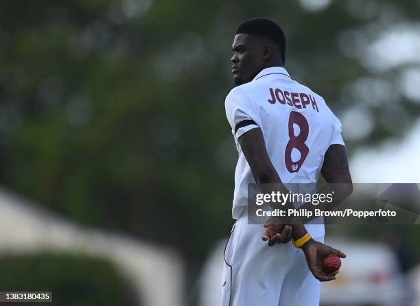 Alzarri Joseph of West Indies looks on during the first day of the first Test against England at Sir Vivian Richards Stadium on March 08, 2022 in...