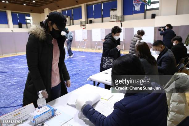 South Koreans cast their vote for a new President at a polling station on March 09, 2022 in Seoul, South Korea. The two front-runners, Lee Jae-myung...