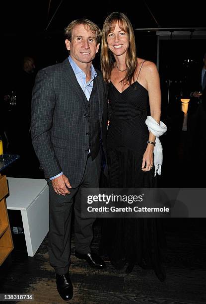 Academy member Robby Naish and guest attend the Laureus Welcome Party as part of the Laureus World Sports Awards 2012 at the OXO Tower on February 5,...