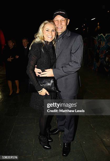 Academy Ambassador Axel Schulz and guest attend the Laureus Welcome Party as part of the Laureus World Sports Awards 2012 at the OXO Tower on...