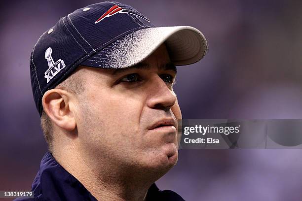 Offensive coordinator/quarterbacks coach Bill O'Brien of the New England Patriots, who will coach Penn State in 2012, walks across the field during...