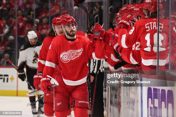 Robby Fabbri of the Detroit Red Wings celebrates his first-period goal with teammates against the Arizona Coyotes at Little Caesars Arena on March...