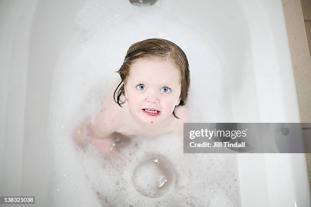 portrait of toddler girl in bath - no clothes girls stock pictures, royalty-free photos & images