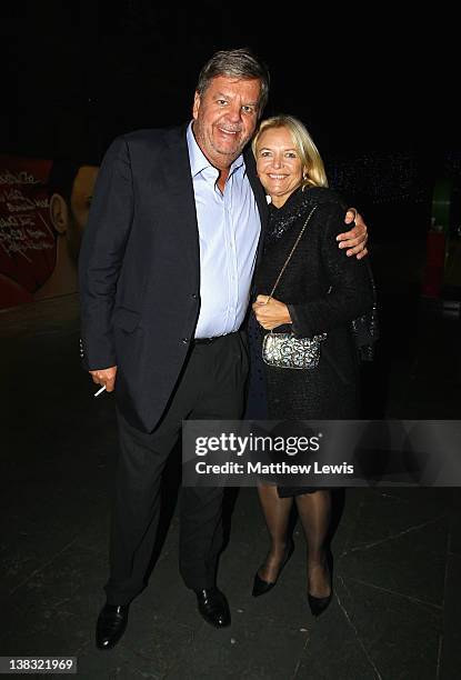 Johann Rupert and guest attend the Laureus Welcome Party as part of the Laureus World Sports Awards 2012 at the OXO Tower on February 5, 2012 in...