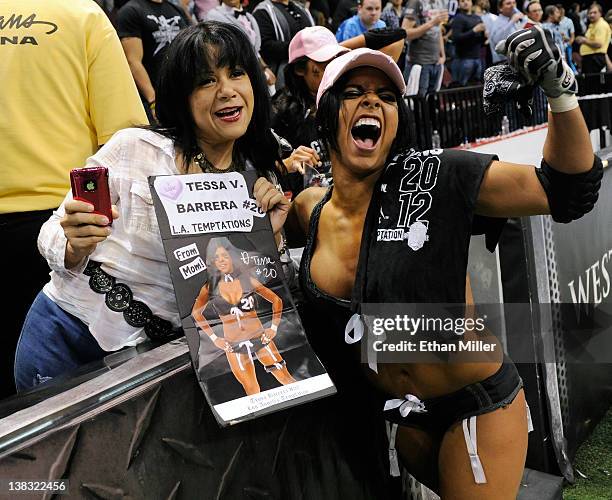 Martha Ruiz celebrates with her daughter, Tessa Barrera of the Los Angeles Temptation, after the team defeated the Philadelphia Passion 28-6 to win...