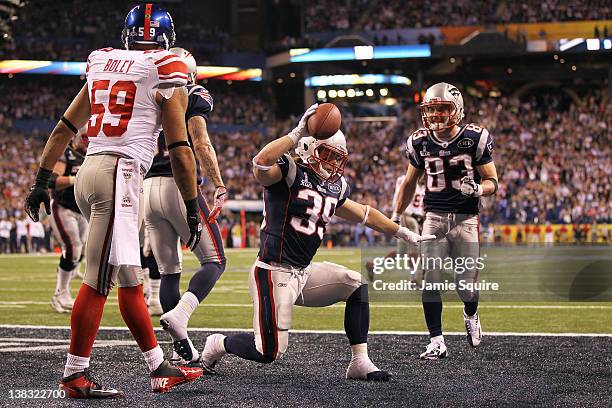 Danny Woodhead of the New England Patriots celebrates after catching a three yard touchdown pass from Tom Brady in the second quarter against the New...