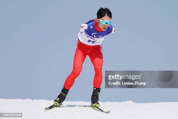 Wang Chenyang of Team China competes in the Men's Sprint Free Technique Standing Qualification on day five of the Beijing 2022 Winter Paralympics at...