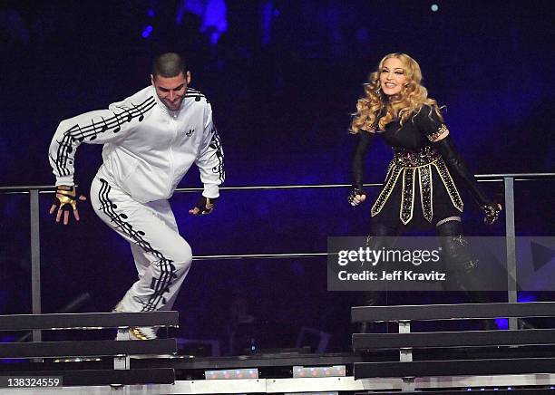 Madonna performs during the Bridgestone Super Bowl XLVI Halftime Show at Lucas Oil Stadium on February 5, 2012 in Indianapolis, Indiana.