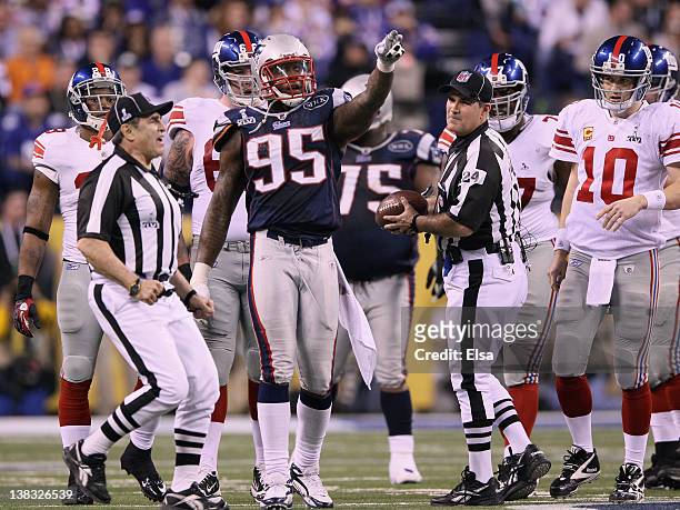 Mark Anderson of the New England Patriots reacts to a play in the fourth quarter against the New York Giants during Super Bowl XLVI at Lucas Oil...