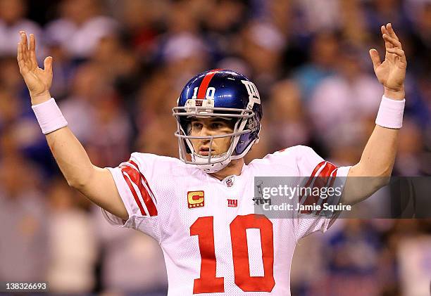 Quarterback Eli Manning of the New York Giants celebrates after Runningback Ahmad Bradshaw ran the ball for a 6 yard touchdown in the fourth quarter...