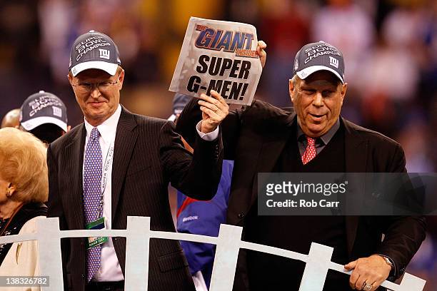 Co-Owners John Mara and Steve Tisch celebrate after the New York Giants defeated the New England Patriots 21-17 to win Super Bowl XLVI at Lucas Oil...