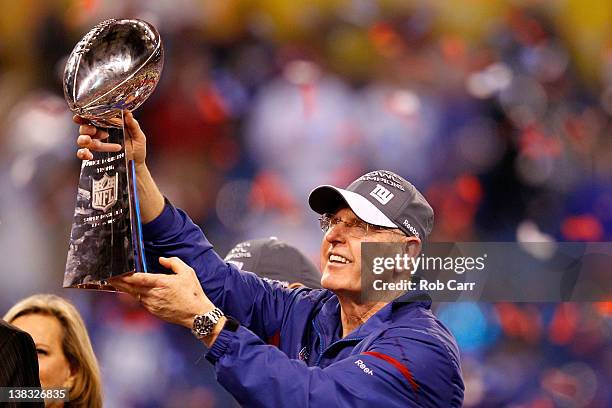 Head coach Tom Coughlin of the New York Giants poses with the Vince Lombardi Trophy after the Giants defeated the Patriots by a score of 21-17 in...