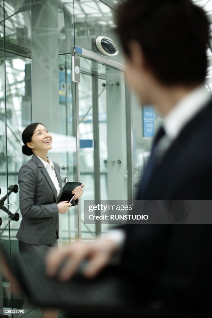 Businesswoman&businessman working outside