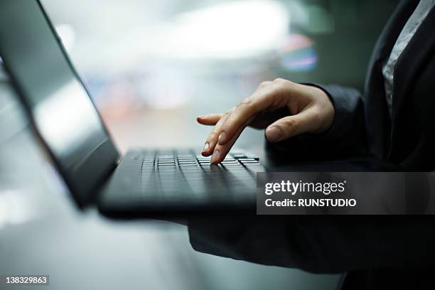 business woman using notebook pc,hands close-up - seoul stock photos et images de collection