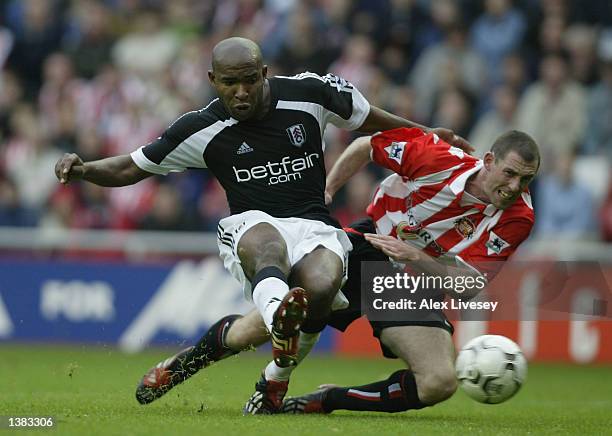 Barry Hayles of Fulham beats Stephen Wright of Sunderland to score the second goal for Fulham during the FA Barclaycard Premiership match between...