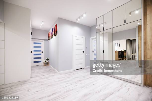 modern apartment hall - wardrobe stock pictures, royalty-free photos & images