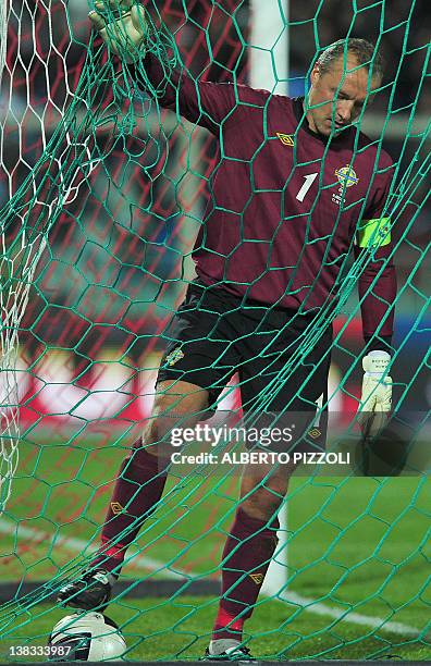 Ireland's goalkeeper Maik Taylor takes ball from his net after Italy scored a goal during the EURO 2012 group C qualifying football match Italy vs...