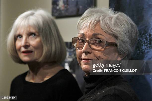 Francine and Annette Doisneau who managed the exhibition "Doisneau : Paris Les Halles", pose in Paris on February 6, 2012. In the same city hall...