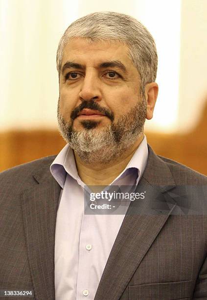 Hamas' Khaled Meshaal attends a signing ceremony in Doha on February 6, 2012. Palestinian President Mahmoud Abbas Abbas will head an interim national...