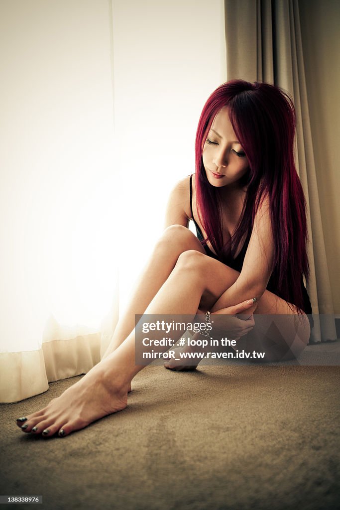 Girl sitting on floor