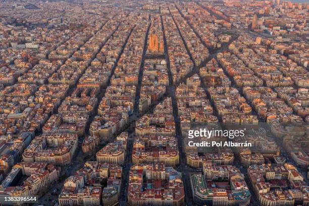 panorama aerial view of barcelona eixample residencial district and famous basilica, catalonia, spain. - barcelona hotel stockfoto's en -beelden