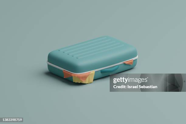 digitally generated image of a blue suitcase full of clothes. - summer travel bag stock-fotos und bilder