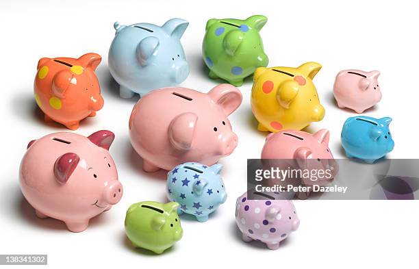collection of piggy banks - quantity stock pictures, royalty-free photos & images