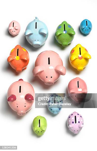 collection of piggy banks from above - collection stock pictures, royalty-free photos & images