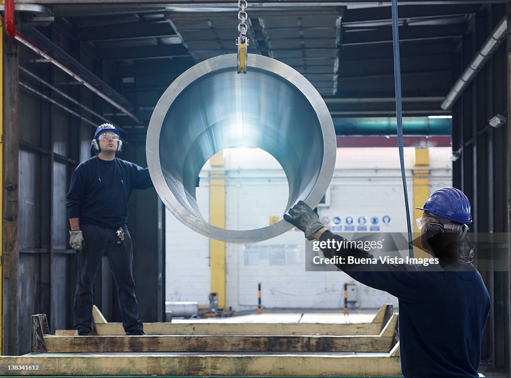 Workers in a steel factory