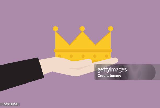 hand mit krone - medieval queen crown stock-grafiken, -clipart, -cartoons und -symbole