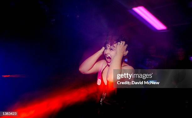 Jennifer Marie Sweeten screams during her audition to become a monster aboard the Queen Mary on September 13, 2002 in Long Beach, California. The...