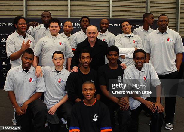 Academy Ambassador Barry McGuigan poses with youngsters as he attends the Laureus Sport for Good Youth Festival at Millwall Football Club's Lions...