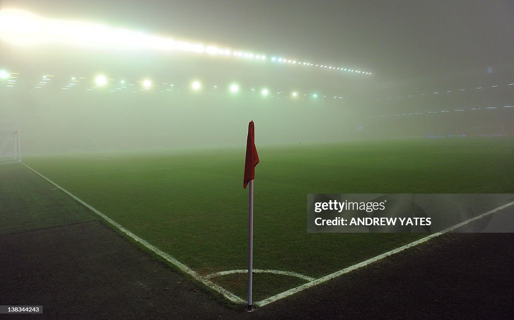 Fog gathers in the stadium prior to the