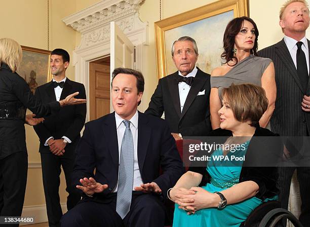 Prime Minister David Cameron talks with former Paralympic athlete Dame Tanni Grey-Thompson during a reception for the 2012 Laureus Awards at 10...