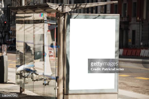 bus stop with blank poster - billboard bus stock pictures, royalty-free photos & images