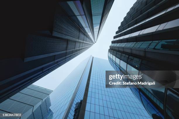skyscraper with transparent glass facade from below - architecture photos stock pictures, royalty-free photos & images