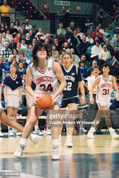 American basketball player Kerry Bascom of the University of Connecticut with the ball during a game against Georgetown, Storrs, Connecticut, 1992.